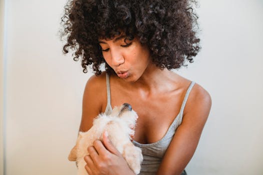 happy pet owner with their dog