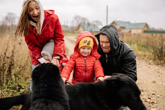 children playing outside with their pets