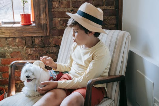 happy child playing with a dog