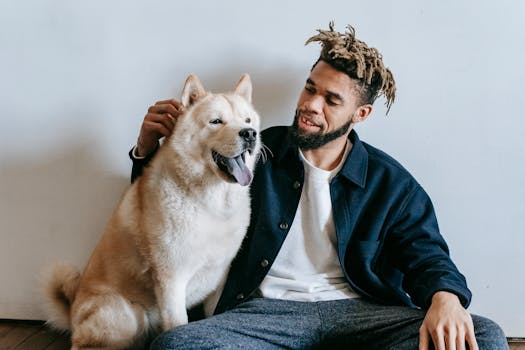 happy dog with owner