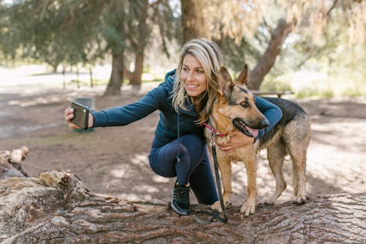 person walking dog in the park