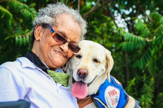 happy elderly person with a dog