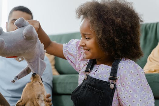 happy child playing with a dog