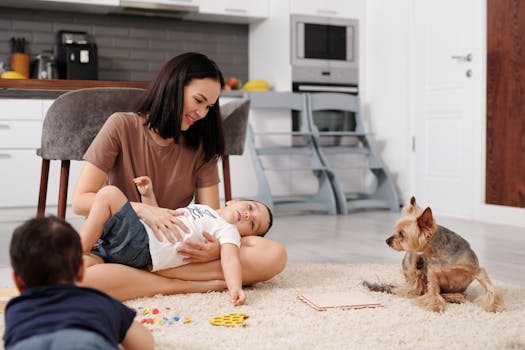 child playing with pet