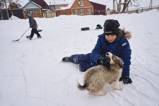 happy family playing with their dog